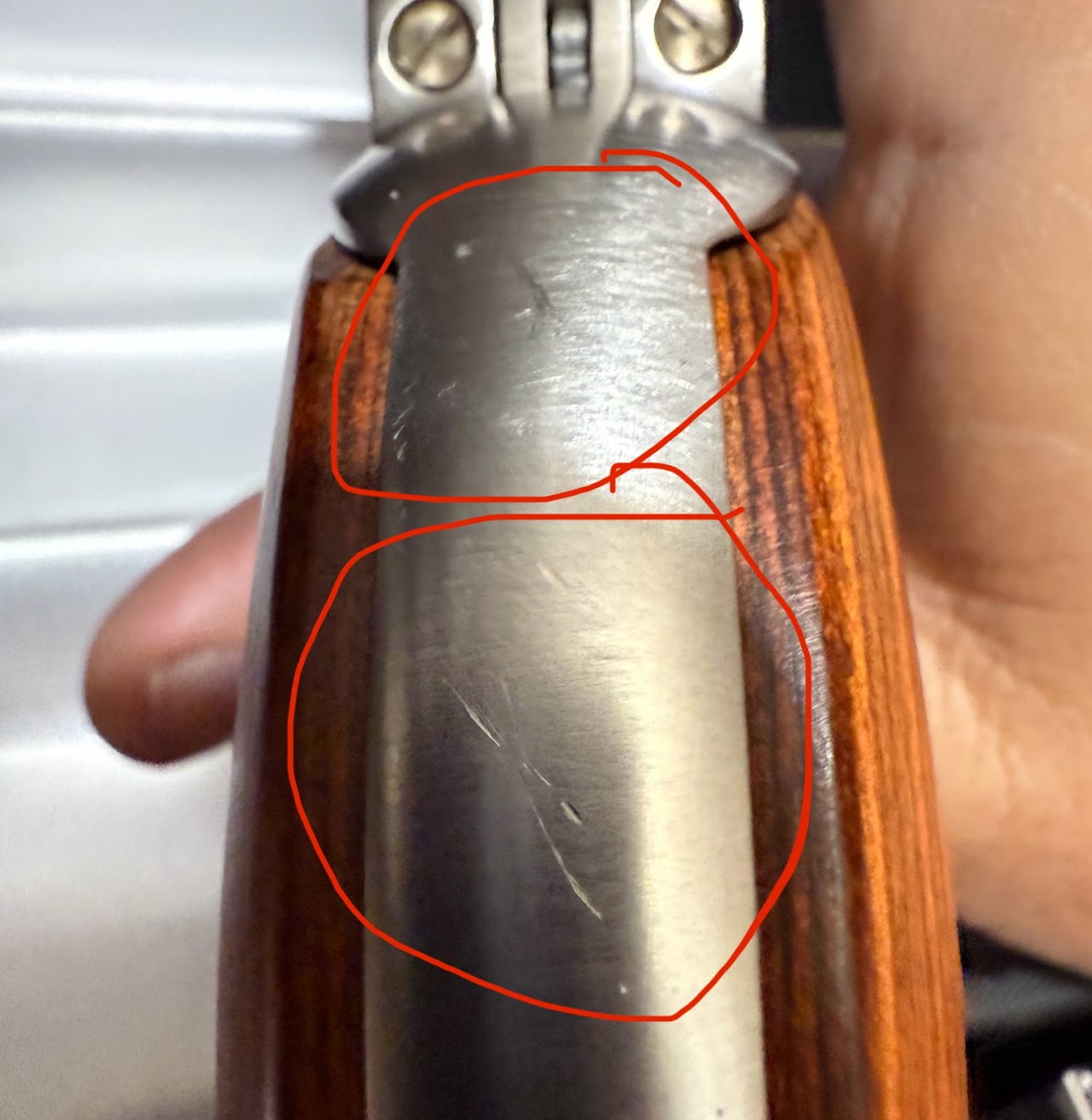 Re-Finishing & Polishing — Scratched stainless barrel marked for rework